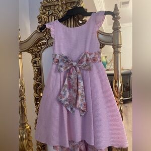 Rare editions bow inside floral dress